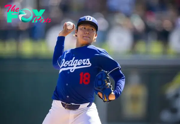 Mar 13, 2024; Phoenix, Arizona, USA; Los Angeles Dodgers pitcher Yoshinobu Yamamoto against the Seattle Mariners during a spring training game at Camelback Ranch-Glendale. Mandatory Credit: Mark J. Rebilas-USA TODAY Sports