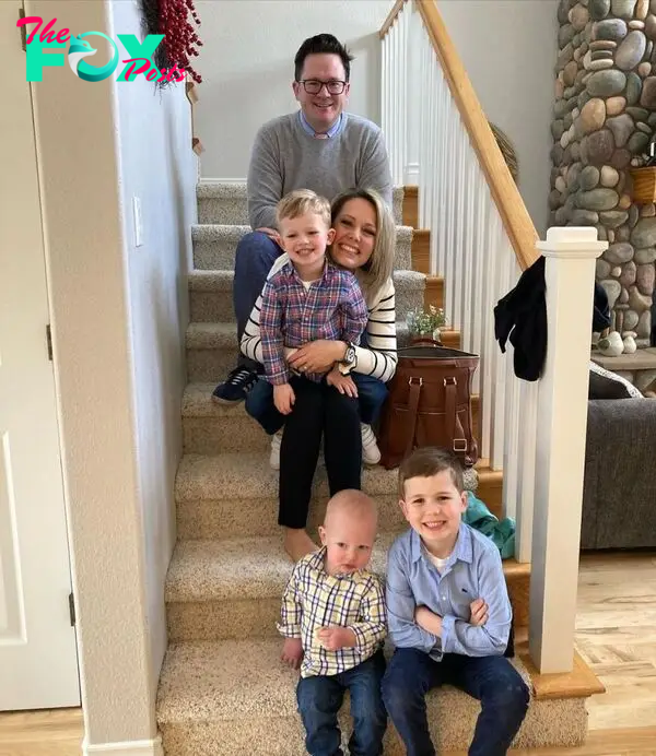 Dylan Dreyer posing with her husband and three sons.