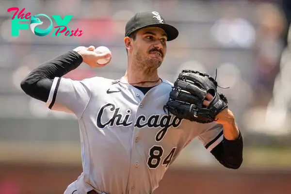 Jul 16, 2023; Cumberland, Georgia, USA; Chicago White Sox starting pitcher Dylan Cease (84) pitches against the Atlanta Braves during the first inning at Truist Park. Mandatory Credit: Dale Zanine-USA TODAY Sports