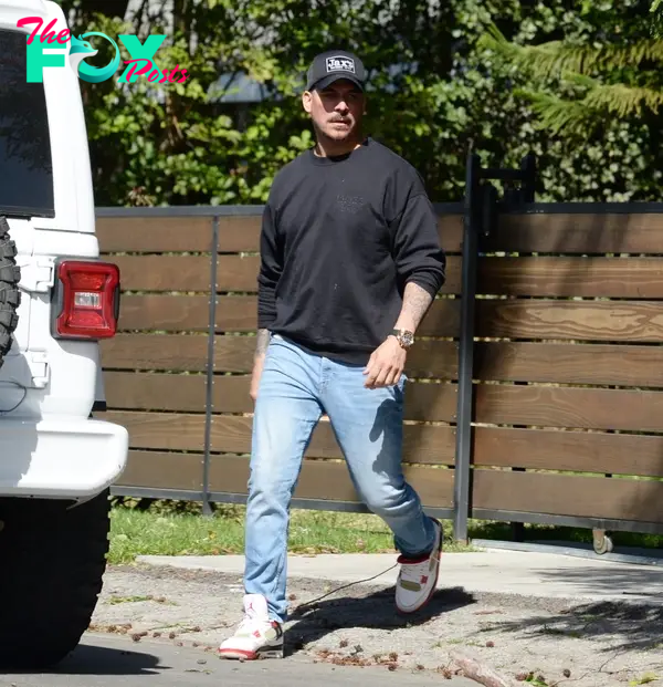 Jax Taylor outside of Brittany Cartwright's new home.