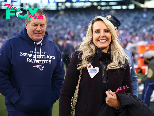 Head coach Bill Belichick of the New England Patriots  and his girlfriend Linda Holliday
