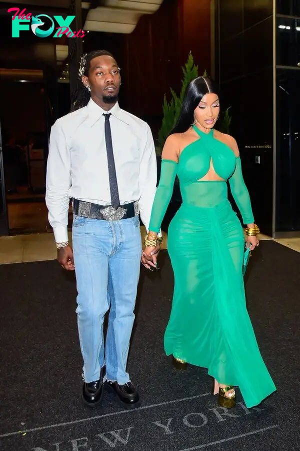 Offset and Cardi B hold hands
