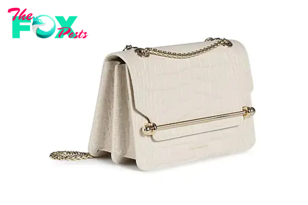 A white croc-embossed purse