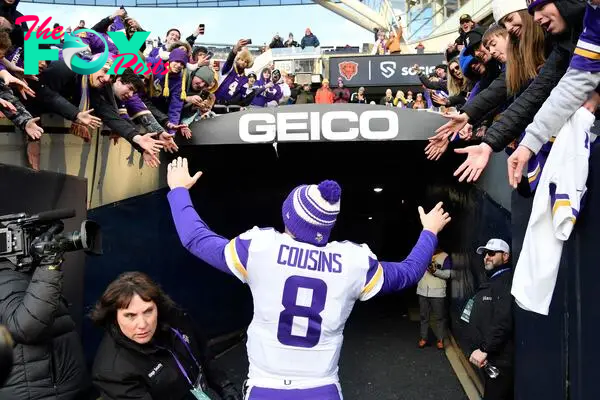 Kirk Cousins #8 of the Minnesota Vikings walks off the field.