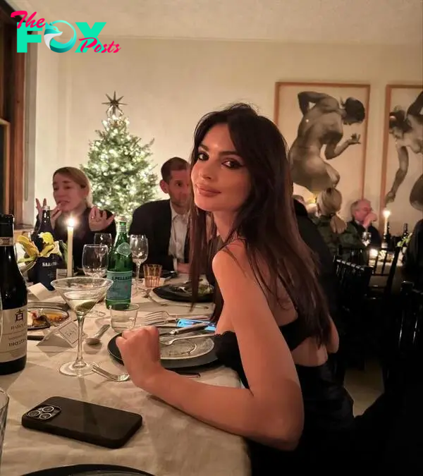 Emily Ratajkowski at a dinner. 