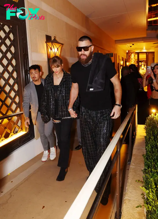 Taylor Swift and Travis Kelce leaving a party in Vegas.