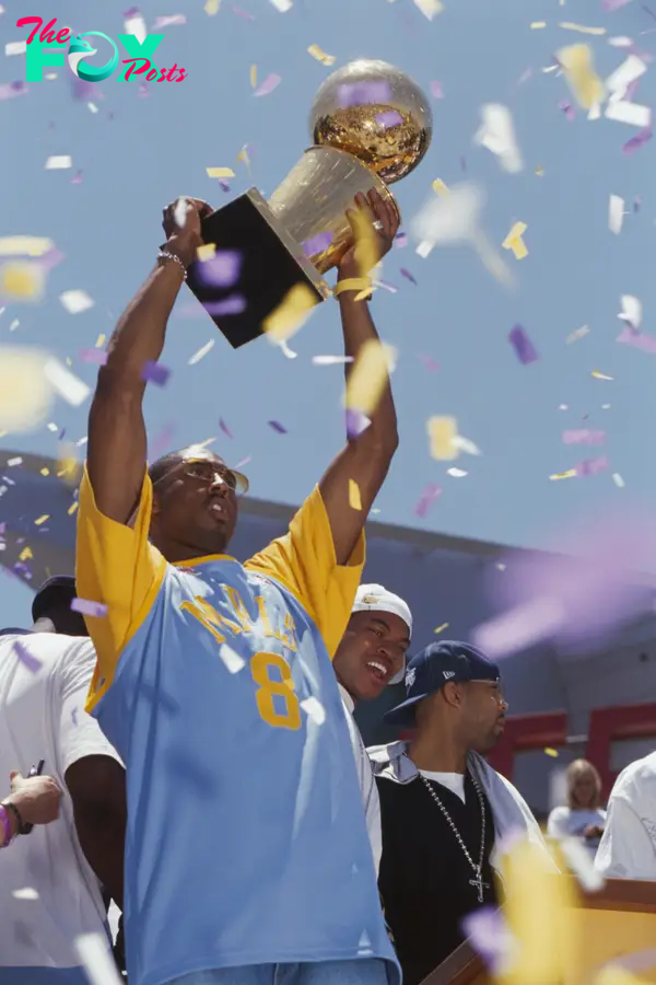 Kobe Bryant celebrating the Lakers' third straight NBA championship at Staples Center.