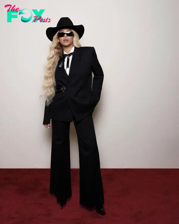 Beyoncé wears a black suit and cowboy hat for Oscars Gold Party 2024