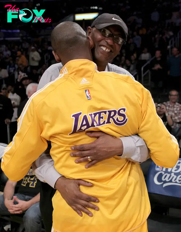 Kobe Bryant hugging his dad, Joe Bryant, in 2010.