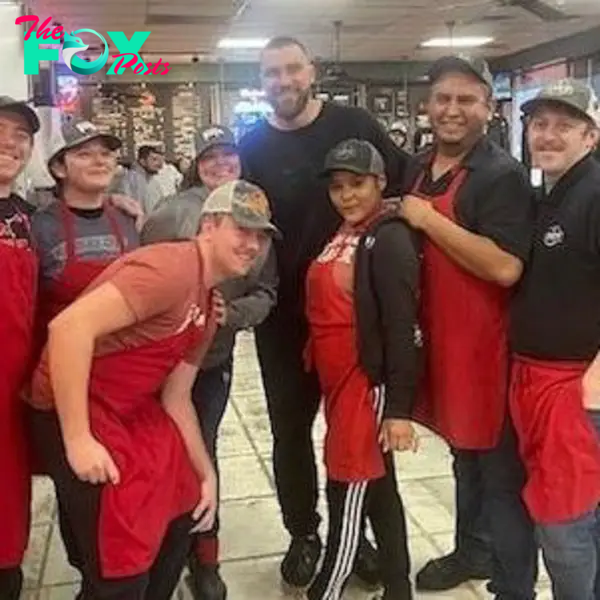 Travis Kelce and restaurant workers