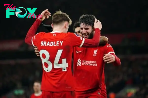 2WFM8C8 Liverpool's Dominik Szoboszlai celebrates scoring their side's third goal of the game with team-mates Luis Diaz and Conor Bradley during the Premier League match at Anfield, Liverpool. Picture date: Wednesday January 31, 2024.