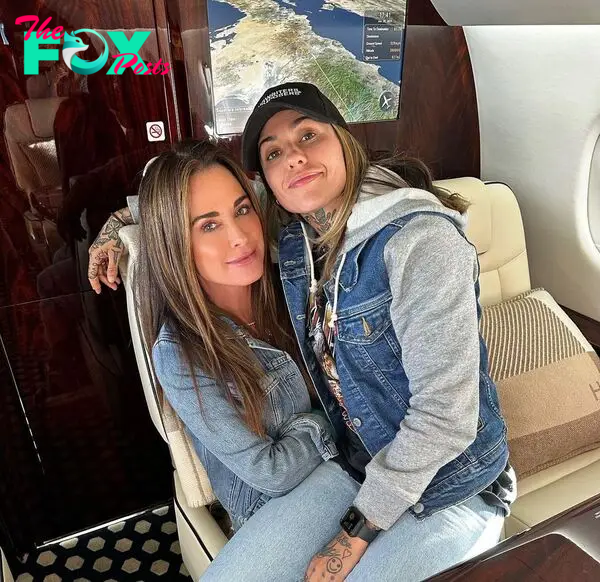 morgan wade sitting on kyle richards on a private jet