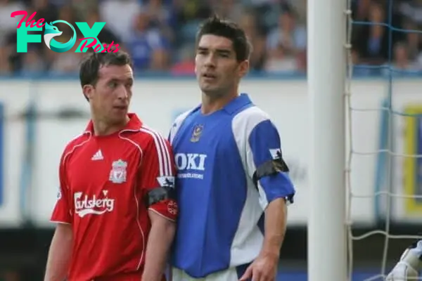 Portsmouth, England: Saturday, April 28, 2007: Liverpool's Robbie Fowler in action against Portsmouth's Richard Hughes during the Premiership match at Fratton Park (Pic by Chris Ratcliffe/Propaganda)