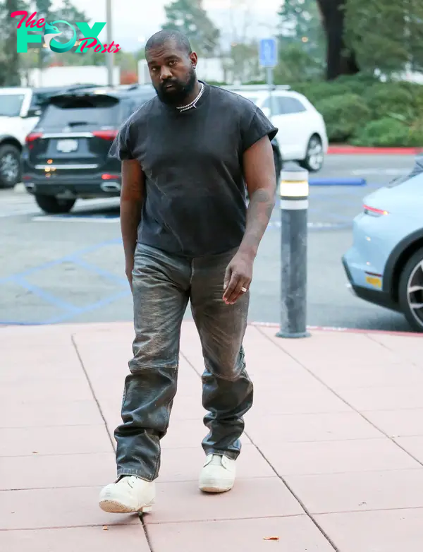 Kanye West walking.