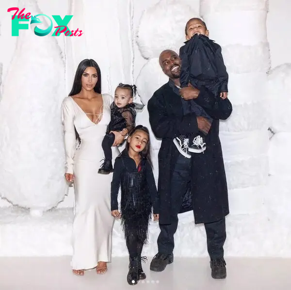 Kim Kardashian and Kanye West with their kids