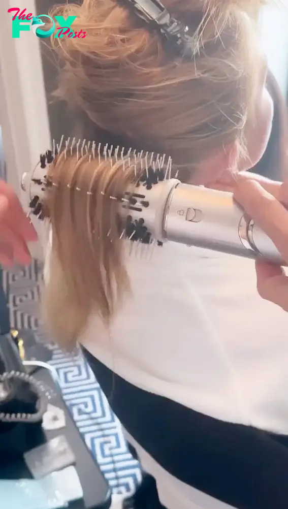 Sydney Sweeney's hair being blow dried