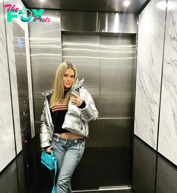leah mcsweeney mirror selfie in an elevator