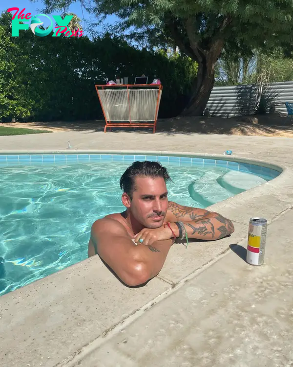 Max Boyens sitting in a pool