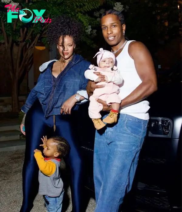Rihanna and A$AP Rocky pose with their sons. 