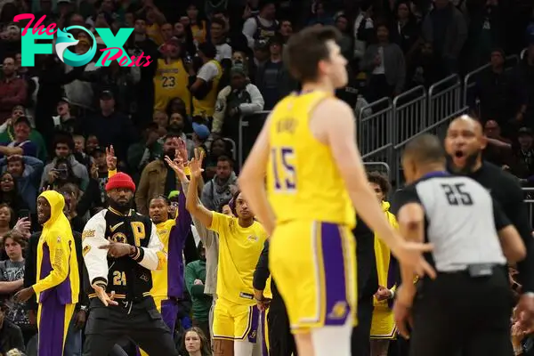 LeBron James #23 of the Los Angeles Lakers reacts to a three point shot by Austin Reaves.