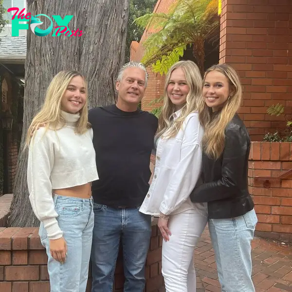 David Beador posing with his daughters.