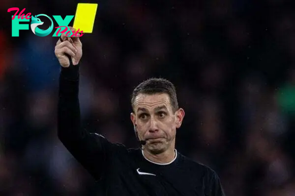 MANCHESTER, ENGLAND - Saturday, December 30, 2023: Referee David Coote shows a yellow card during the FA Premier League match between Manchester City FC and Sheffield United FC at the City of Manchester Stadium. Man City won 2-0. (Photo by David Rawcliffe/Propaganda)