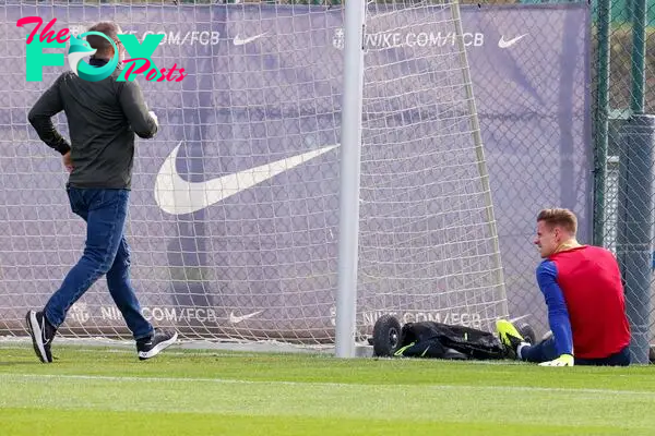 Medical staff raced over as Ter Stegen went down in training.