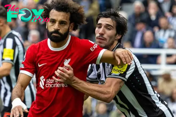 NEWCASTLE-UPON-TYNE, ENGLAND - Sunday, August 27, 2023: Liverpool's Mohamed Salah (L) is challenged by Newcastle United's Sandro Tonali during the FA Premier League match between Newcastle United FC and Liverpool FC at St James' Park. Liverpool won 2-1. (Pic by David Rawcliffe/Propaganda)