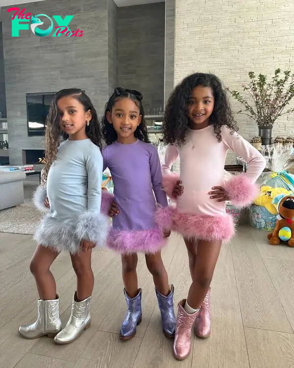 Chicago (Kim's daughter), Dream (Rob's daughter) and True (Khloé's daughter) posing on Easter