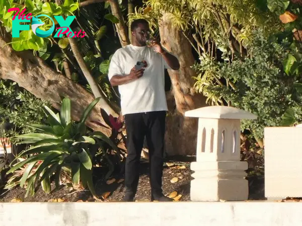Sean "Diddy" Combs outside his Miami home.