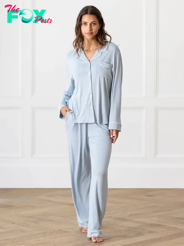 A model in light blue pajamas