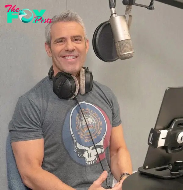 Andy Cohen talking into a microphone 