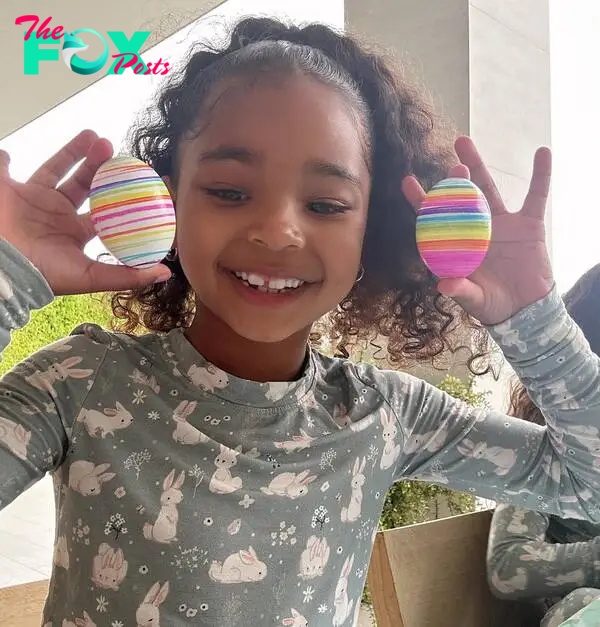 A child holding Easter eggs