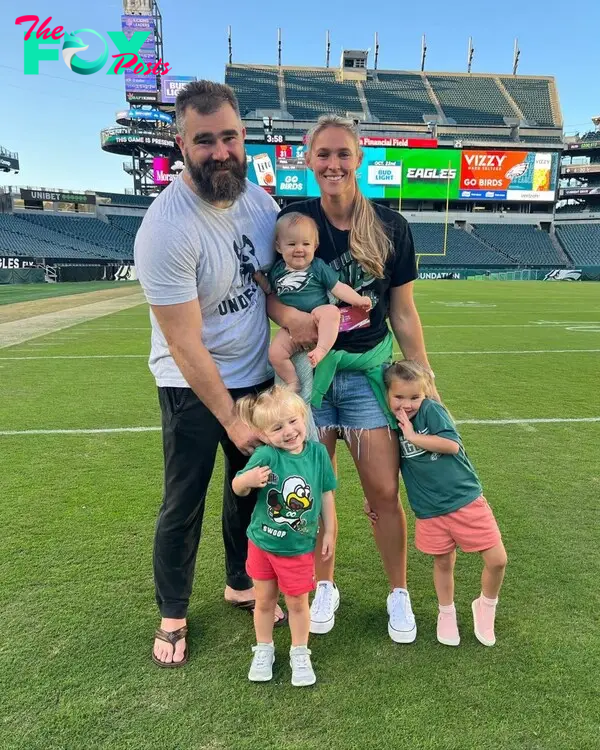 Kylie Kelce and Jason Kelce with their three ids. 