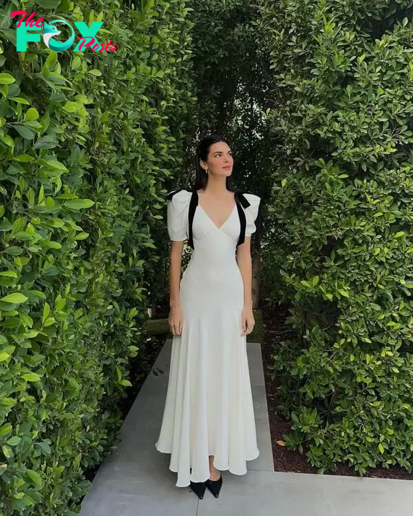 Kendall Jenner standing in front of bushes on Easter.