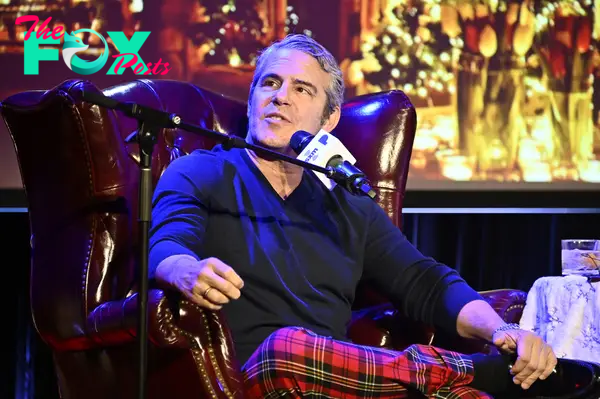 Andy Cohen talking into a mic