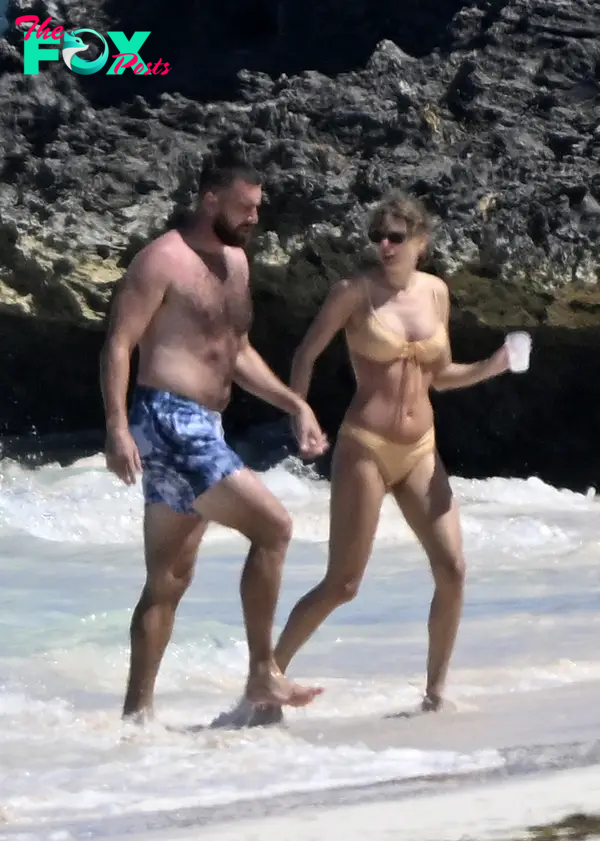taylor swift and travis kelce on the bahamas beach