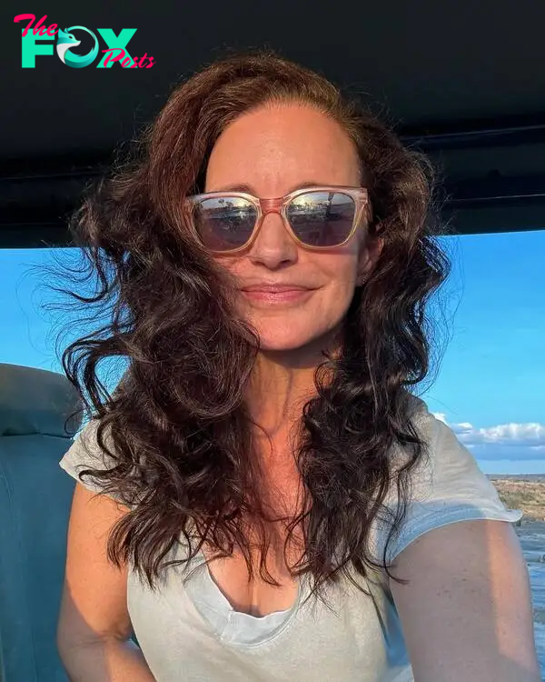 Kristin Davis takes a selfie wearing sunglasses.