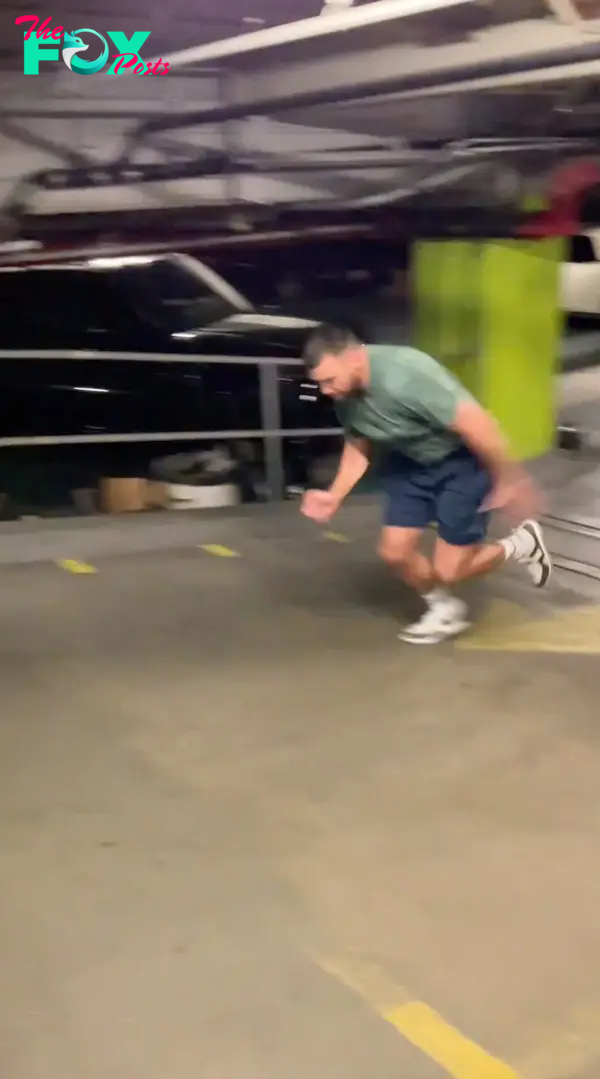 Travis Kelce working out.