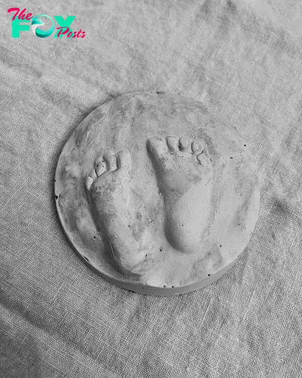 concrete cast of baby feet