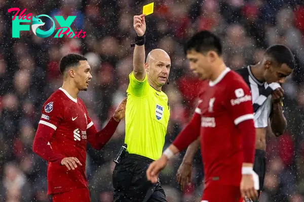 LIVERPOOL, ENGLAND - Monday, January 1, 2024: Liverpool's Wataru End? is shown a yellow card by referee Anthony Taylor during the FA Premier League match between Liverpool FC and Newcastle United FC on New Year's Day at Anfield. Liverpool won 4-2. (Photo by David Rawcliffe/Propaganda)
