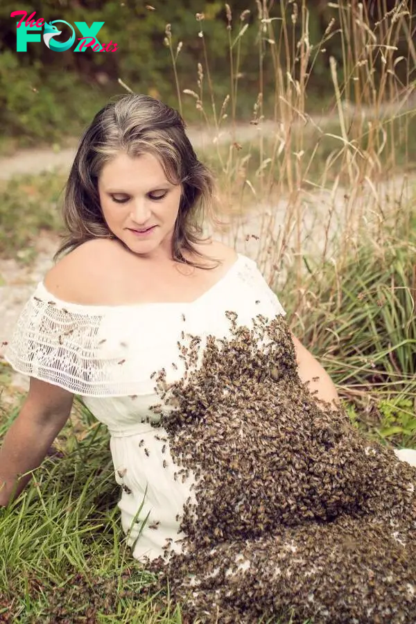  A mum sparked fury online after she posed for maternity pictures with thousands of bees swarming around her belly