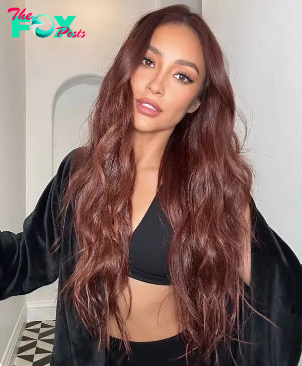 Shay Mitchell with long red hair