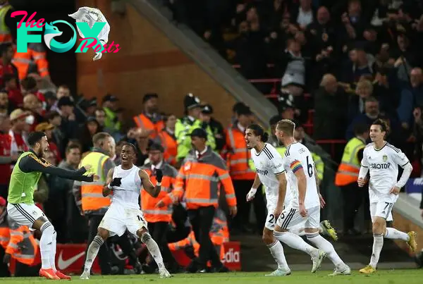 Leeds' Crysencio Summerville celebrates with teammates after scoring the winner against Liverpool.