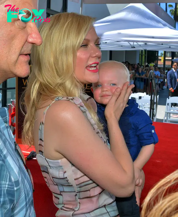 Kirsten Dunst with her son