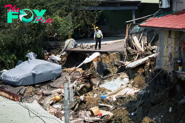Damaged houses and road following an earthquake in New Taipei City, Taiwan