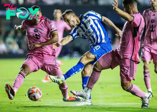 CF Monterrey midfielder Sergio Canales (C) in action against Inter Miami defender Nicolas Freire (L) and Inter Miami defender Marcelo Weigandt