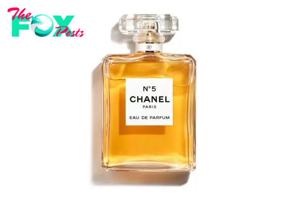 A Chanel No. 5 bottle filled with gold-colored parfum