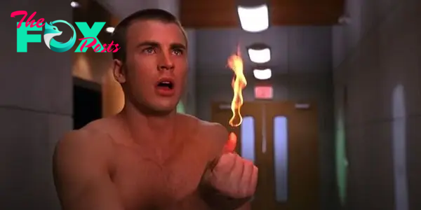 Chris Evans as The Human Torch lighting a fire with his fingers in Fantastic Four (2005)