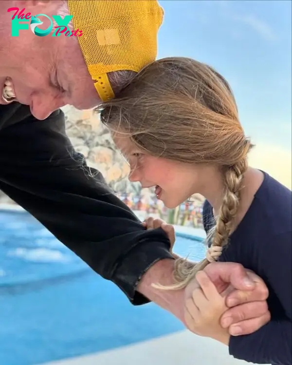 Eric Johnson and his daughter at the pool in Cabo San Lucas, Mexico. 